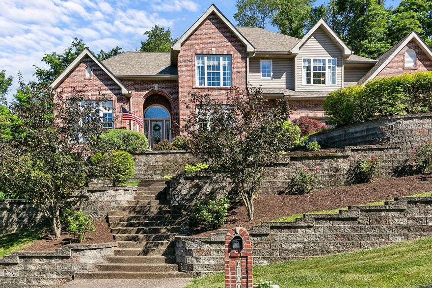 Welcome to this beautiful two-story home that offers nearly 4,000 sq ft of living space. This wonderful home is situated on 1 acre atop a hill with picturesque views.  On the main level you'll find a stunning new chef's kitchen with Quartz counter tops, stainless steel appliances, marble backsplash, a massive island,  impressive pantry, and tons of storage. The open main floor has beautiful refinished wood floors and plenty of room to spread out. Great-room has gas fireplace with custom stonework and a handcrafted mantle. Main floor laundry, a dining room currently being used as a library, and an executive office complete the main floor. The 2nd floor includes 3 large bedrooms and an expansive Master with his/her walk-in closets and dual vanities in the ensuite. An add'l full bathroom with two vanities serves the other bedrooms. Finished basement offers 3 add'l large bedrooms, full bath and tons of storage. . Oversized 3 car garage. Extensive updating has been done.