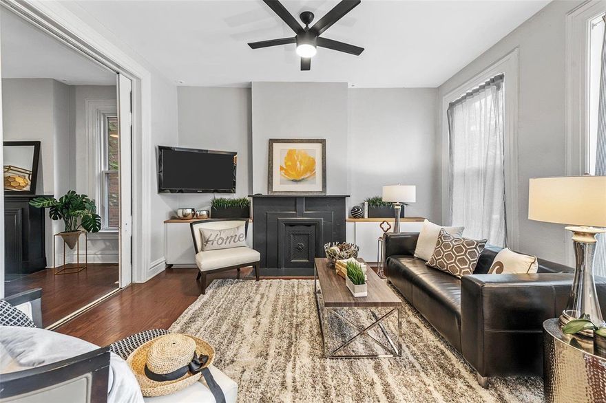 Located in historic Compton Hill Reservoir Park neighborhood with park/walking trails, play ground, tennis courts and dog park just steps away! Step inside this elegant 3 bedroom, 2 bath single family home & be swept away by the details of this beauty.  The living room is spacious with tons of natural light, opened up to the dining room for open floor plan- both have old world feel with pocket doors & ornate fireplaces. Enjoy your morning coffee at the breakfast bar with exposed brick breakfast nook. The kitchen features stainless steel appliances, butcher block countertops with open shelving. Beautifully updated full bath on main floor. Upstairs has 3 large bedrooms all featuring high ceilings & natural light. The master bedroom has hardwood floors & an ornate fireplace adding historic charm. Completing the upper level is another full bath & laundry. Located off the kitchen is your private brick lined courtyard with a privacy fence creating a perfect space to entertain.