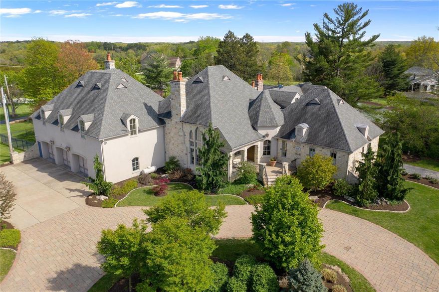 Terrific custom residence w/an extremely private setting located on over 3 acres w/ a spacious veranda, luxurious pool, tennis court, extensive landscaping & 3 car garage. The 2005 custom renovation & gracious addition transformed the house, offering the luxury living of new construction along w/its original charm. The spectacular kitchen has custom cabinets, granite counters, double ovens & butler’s pantry. The adjoining great room has 18ft ceilings & beautiful custom windows that brighten the room & allow you to admire the views. Most of the main level has hickory wood floors. The main floor large master suite offers a two walk in closets & luxurious master bath. There are 2 additional main floor ensuite bedrooms. In addition there are 2 separate upper levels. The 1st offers a family room/media room, home office/sitting room & powder room. The 2nd upper space has a rec room w/ another bedroom & full bath. The LL is awesome too w/ built-ins, half bath & bar. Truly one of a kind! Additional Rooms: Mud Room