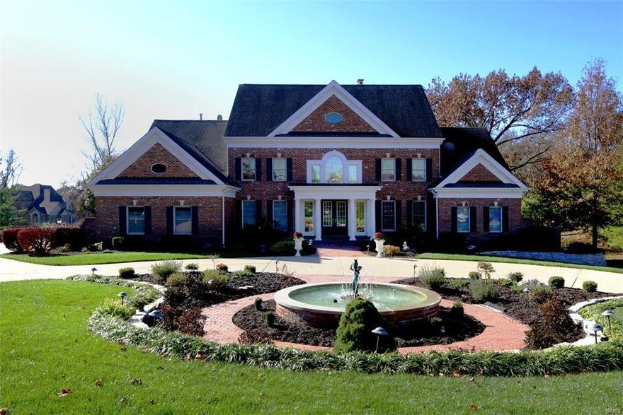 Open Sun. 1-3 on Mar. 20th! Priced to sell...100k under current appraisal! Gorgeous custom built home on 1.1 acres on sought after lane. Stunning light-filled 2 story entry w/marble flooring & palladium windows. Spacious great room has bookshelves flanking the fireplace, French doors to the deck & gleaming hardwood floors. The gourmet kitchen has granite counter tops, custom cabinets, huge center island w/breakfast bar, wine cooler, open breakfast and hearth rooms.  Wood paneled study/den is exquisite.  The step-down master suite is breathtaking & includes a wine bar, sitting room w/ see-through fireplace to the luxury bath, and his and her closets. The walk-out 10' lower level has been professionally finished as well; family room w/wet bar, huge game/billiards room, bonus room/playroom, theatre room, tons of storage & another bedroom & 2 full baths. 3+car garage, Mn. fl. laundry, detailed molding, 4 zone HVAC, Central Vac, & spectacular landscaping! High-end estate, w/over 7800 SQ FT.