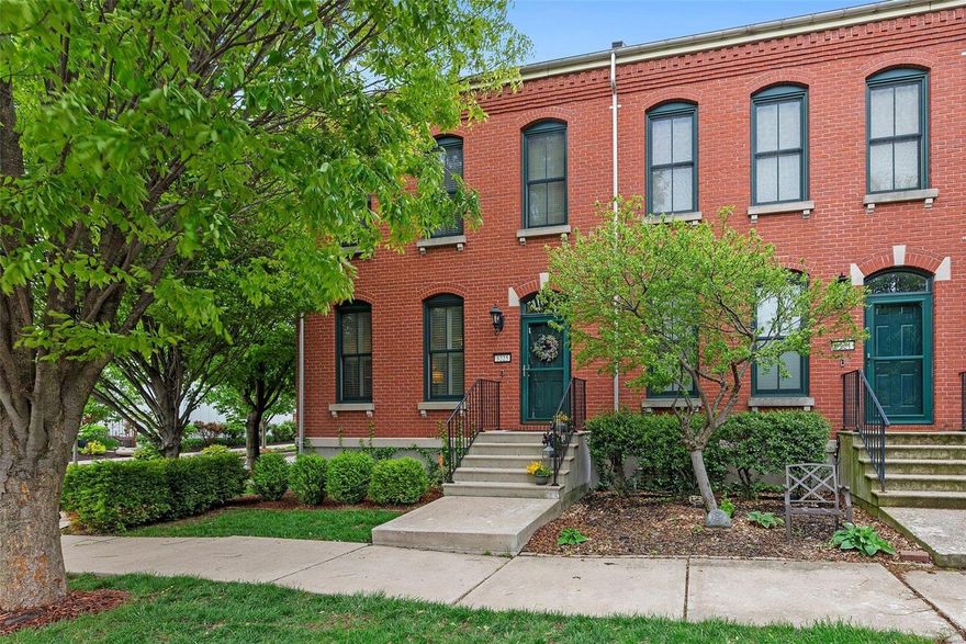 WOW...This is NOT your ordinary Row Home...Rare New Town Gem that offers tons of Amenities! Whether it is the Stunning Hardwoods through out main floor, Tons of Windows w/Plantation Shutters, Beautiful Kitchen with newer quartz countertops - White Cabinets and Stainless Steel Appliances, Spacious Courtyard, the large Balcony, or the over 2500 square foot of living space, you will LOVE coming home!  This home is situated on a corner lot lined with Trees and features a Rear Entry 2 Car Garage, Newer Siding, Newer Roof, 9 foot ceilings, 3 Bedrooms, 2 Full Baths and 2 half Baths including one in the Professionally Finished Lower Level with Bar, Large Rec Room.  Don't worry about carrying laundry far, as it is right outside the Master Bedroom Suite!  Move in just in time for the Pool to open for the Summer, enjoy evening walks, Ice cream, Shopping, Farmers Market, Lakes and Much More!  There is nothing to do but move in!