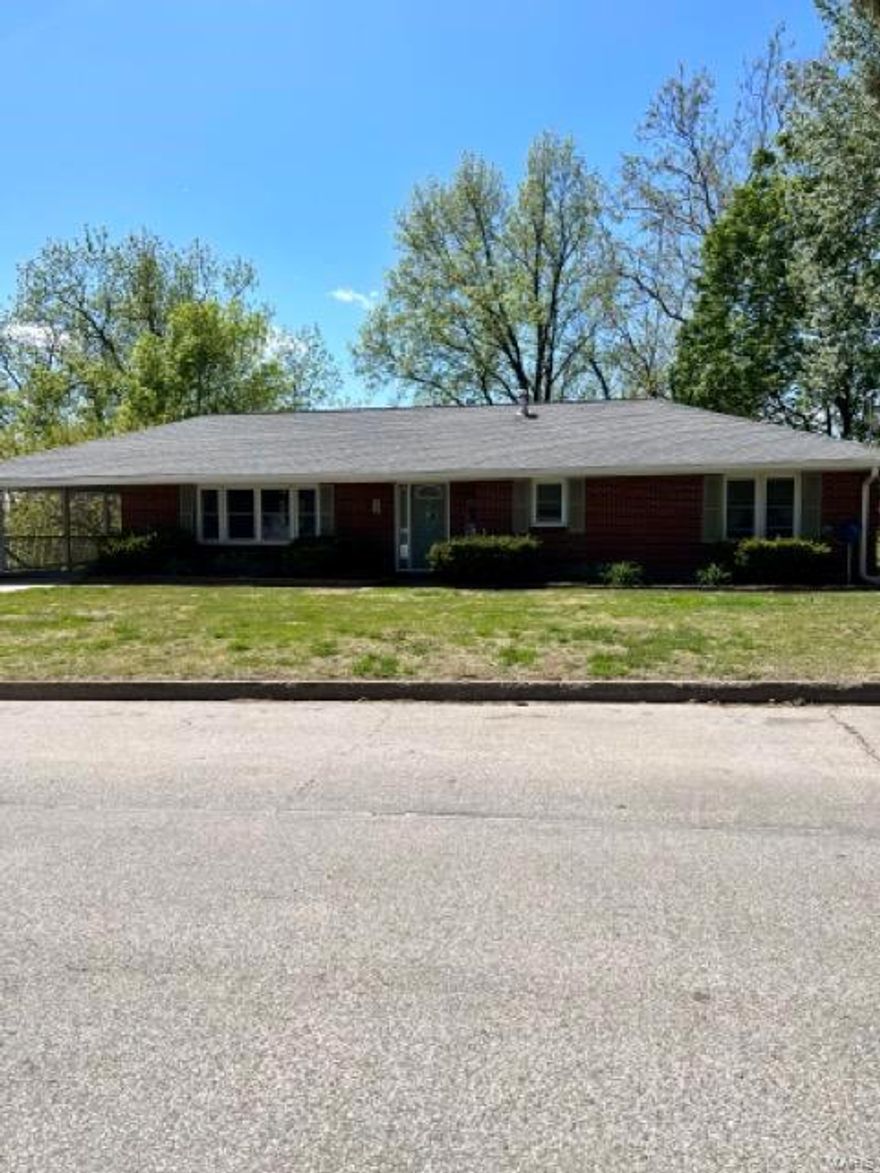 This full brick home with modern touches is ready to move in! Three bedrooms and 1.5 bathrooms have engineered and wood flooring, new tilt-in windows and a spacious kitchen with beautiful cabinets. Downstairs is partially finished, offering more space for family recreation, a wet bar, laundry area, walk out sliding doors to a patio area, more storage with built in storage shelving, separate storage for your lawn mower and access to a large wooded back yard that makes you forget you are in the middle of town. Call today to schedule your private tour!