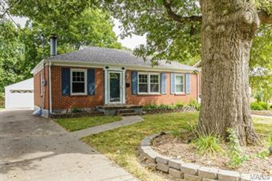 Looking for a charming home in a great mid St. Charles location? This updated all brick bungalow is waiting for you! As you walk in the front door you enter a large living area that can be used as Living Rm or a LR/DR. There are beautiful hardwood flrs, wood cased windows and ceiling fans throughout the main living area. There is a gorgeous brick FP w/raised hearth and a custom wood mantle. The Kitchen is updated w/raised panel Maple cabinets, ceramic tile floor, ceramic tile backsplash, smooth top range, built in micro, D/W, Kohler sink and an island w/brkfst bar and cabinet storage underneath. A lower level rec room adds nearly 500 sq ft of additional living space. Neutral, tasteful wall colors and decor. There is a 2 car detached garage, a large covered patio w/a nice landscape/garden area and a large, level fenced yard. The HVAC is newer (2013), new roof and gutters (2015) and new LL carpet (2015). Close to Historic Main St, grocery shopping and more. So much to love, check it out!