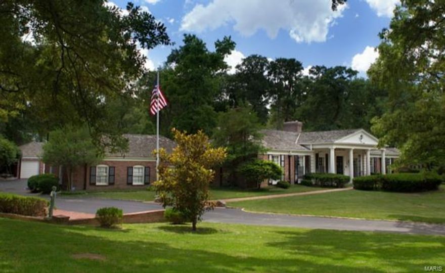 Noted as one of Ladue's signature homes, this magnificent ranch is situated on 3+ acres on a private lane. The Ladue Bridle Trail borders this wooded & nature filled neighborhood that is a tucked away gem worth exploring. Famed home builder, Hank Altepeter, built this home for his family in his signature county club style. The 34'x28' handsomely paneled family room, captivates family and guests with its soaring ceiling, sunken bar, & adjoining billiard room. The signature ceiling to floor walls of glass access the romantic Edith Mason patio garden with a tranquil cherub fountain; the perfect setting for the tennis court and saltwater swimming pool. The master suite accesses a covered porch, while the spa like bath accesses the pool. There are 3 more bedrooms on the main floor with updated baths. The walk out lower level has a private guest room, second family room, rec room, & visitor bath/changing area, that accesses the pool as well. The 5 car garage is an auto enthusiast delight. Additional Rooms: Mud Room