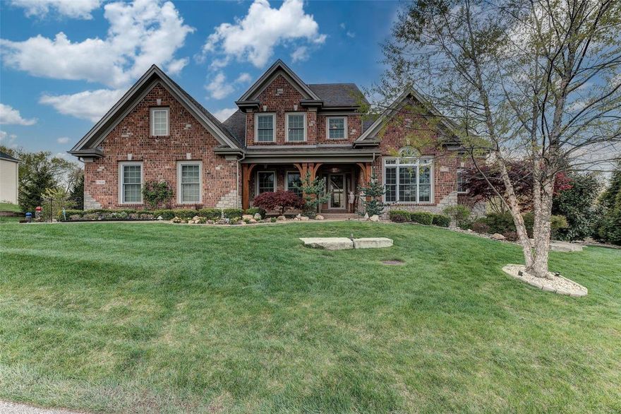 Beautifully appointed, meticulously maintained custom built 1.5 story home nestled on 1 acre in Homestead Bluffs. This 5-bdrm, 6 bath home boast countless features including: an impressive great room with a wall of custom wood-framed windows, a gas fireplace and built-ins. The kitchen includes granite center prep island & breakfast bar, built-in Miele coffee/cappuccino system, steamer oven, infra-red oven/microwave, subzero refrigerator, and huge walk-in pantry. The Hearth room, nestled next to kitchen, host the 2nd fireplace - perfect movie nights! Main floor primary bdrm has vaulted ceilings, dual closets, over sized bath and separate vanities. The upper-level shares 3 bdrms, 2 full baths and loft area. Enjoy the custom finished walk-out lower level with egress, wet bar, full bath, 5th bdrm, and work-out room. There is a screened-in 3 season sun-room leading to the custom deck, and a whole house generator to supply electricity for your family in case of an emergency. Welcome Home! Additional Rooms: Mud Room