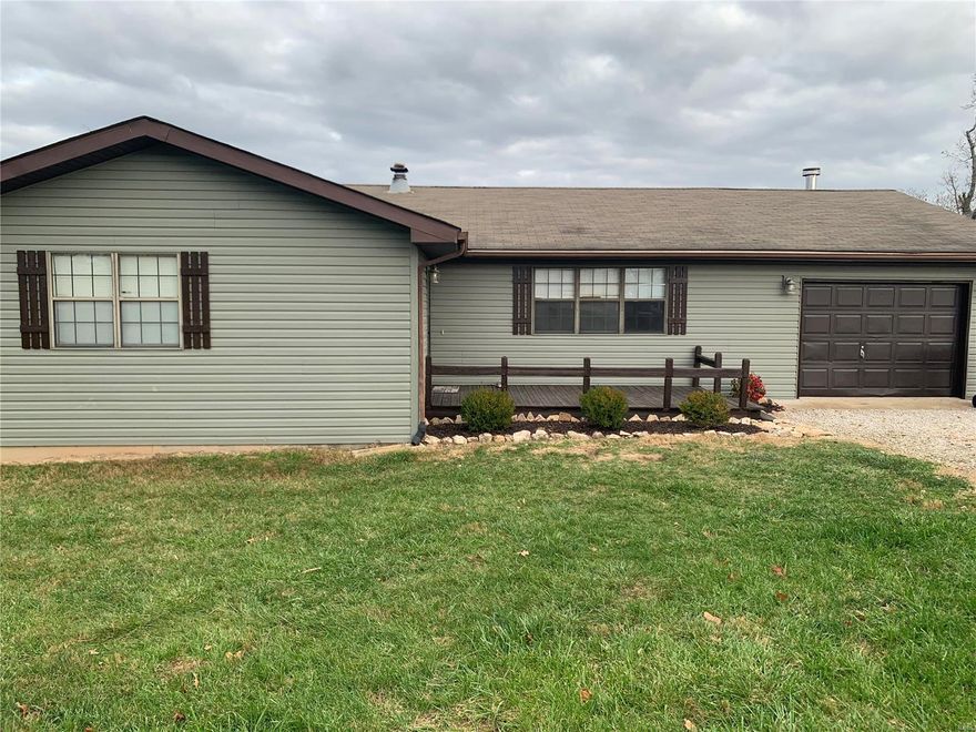 Great location to the South Gate of Fort Leonard Wood.  Adorable 3 bedroom/ 2 bath home sitting on a one acre corner lot.   Nice sized rooms with beautiful fireplace and a septic system installed in 2019. The house has central heat and air but also has ductwork ran for a wood heater if buyer chooses to install.  Nice deck and flat yard gives that country feel yet close to Fort.  Such a cute house.  It's a must see!