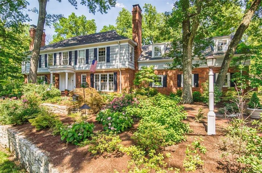 A touch of New England in the heart of Ladue. This gracious colonial home is set on more than an acre of beautifully landscaped grounds. Centrally located 6 bedroom, 4.5 bath home with over 5600+ sq ft of living space offers comfort while honoring tradition. Generous-sized living room and dining room with basket weave hardwood floors, built-ins and woodburning fireplace. The remodeled eat-in kitchen includes a large center island, granite countertops, high-end appliances & dumbwaiter to all floors. Family room with wood-burning fireplace and wetbar. Large master bedroom suite with, WBFPL, 4 closets, and master bath with double vanity. 5 large secondary bedrooms and 3 baths are found on the 2nd floor. Back staircase gives privacy to out-of-town guests. An additional room on the 2nd floor currently used as an office can easily be converted to large 2nd floor laundry room. Lower level with full kitchen for entertaining. Pool. Patio & screened porch. 3 car garage. Walk to MICDS.