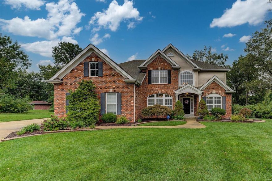 Newer move-in ready, 5 BD, 5 bath light-filled gem loaded with upgrades with approximately 5,400SF of finished space on 3 levels in a private tree-lined cul-de-sac neighborhood. Updates include new granite in kitchen, butler's pantry, & baths, plus new stainless appliances, newer roof, interior paint, and one newer A/C & water heater. Flexible floor plan w/5th BD on main level, perfect for nanny, relative, or out-of-town guests.  Amenities include wood floors, sprinkler, sec system, zoned HVAC, electric car charger in garage, planning desk & walk-in pantry in kitchen. The upper-level feature 4 BD, 3 baths including a spacious primary suite w/sitting room & luxury bath with jet tub. Wonderful FIN LL has a rec room, playroom, home theater with built-in cabinets with surround sound plus a 5th bath with shower.  The level wooded private rear yard is ready for a swimming pool. Sought-after convenient location.  Enjoy the walking/bike path to Stacy Park and Old Bonhomme School. Additional Rooms: Mud Room