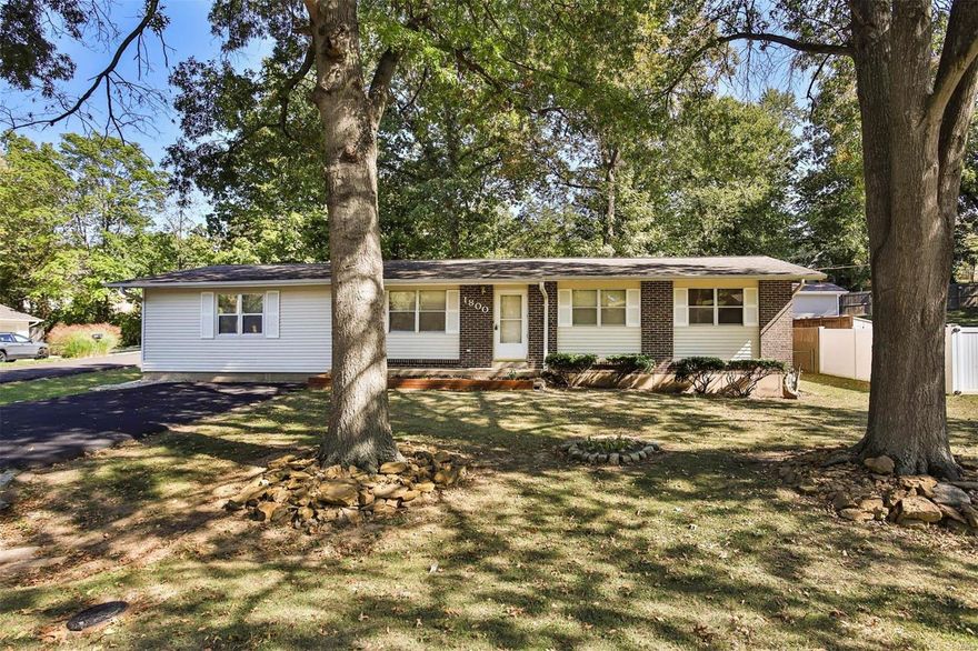 This High Ridge charmer offers a ton of curb appeal! Sitting on a large, corner lot it features mature trees, a fence, wood deck, shed, and recently sealed driveway. Inside you'll notice the abundance of natural light and hardwood floors just waiting to be refinished. The main level has a large family room with a full stone, wood burning fireplace and 4 bedrooms!! The full, unfinished basement has the washer & dryer (which stay with the house!) and tons of storage space. Newer HVAC, roof, and water heater. This home is AS-IS and just waiting for your updates and TLC!!