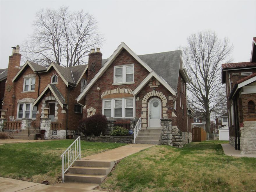 Opportunity knocks! Heart of Holly Hills. Brick and stone 3 BDR, 2 BATH charmer on divided parkway boulevard just steps from historic Corondolet park. Enter your spacious living room with refinished oak floors, stain glass, and gorgeous millwork.  Enjoy full dining room, great for family dinners. You'll love the updated kitchen with 42" custom cabinets, range, microwave, plus central island. Opens to vaulted porch, level fenced yard, ang garage with opener. Full tile bath on main and on 2nd floor. Lots of character throughout with stain glass, walk-in closets, and finished lower level with office, family room, and washer and dryer. This is your chance to own a home on desirable Holly Hills Boulevard. Additional Rooms: Sun Room