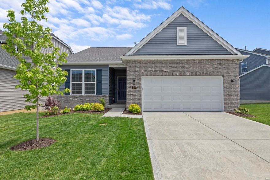 Why build when you can buy this 1yo Payne home with a spectacular finished LL? Tucked away in sought-after Wilmer Valley, this charming ranch welcomes you with a brick/stone elevation and soothing colors. Inside, you'll find soaring ceilings, designer paint colors, and tons of brand new LVP flooring throughout most of the main level. You'll love the spacious great room with fireplace that opens up to a large dining space and upgraded open kitchen complete with SS appliances, 42" cabinets, and a breakfast bar that's perfect for entertaining. The split bedroom floorplan allows for optimal privacy, the spacious master suite is filled with natural light, and don't miss the convenient main floor laundry! In the walkout LL you'll find a professionally finished rec room w/ office nook, a full bath, and TWO additional spacious legal bedrooms! Don't miss the massive back patio and fully fenced level yard! Enjoy the neighborhood walking trails and stocked fishing lake!