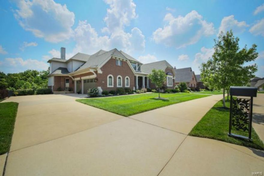 A rare find. 1 of only 5 Elite Hayden-built homes in Reserve At Chesterfield.Amazing, nearly-new, 1.5 story custom home w/ 6500+ sqft of living space, backs to Chesterfield's Riparian Corridor w/acres of privacy & incredible views.Top-of-the-line features include 4 HVAC zones, 8 Baths, 5 Bedrm Suites, 4 fireplaces, Screened-in Porch & covered Patio. Open Kitchen has 2 islands, custom cabinets, granite & top-of-the-line appliances.Professionally finished walkout Lower Level includes 10’ ceilings, Theater Rm with state of the art DLP surround sound, Rec Rm & Wetbar w/ 2nd dishwasher and granite and wood countertops.Main floor Master Suite has its own HVAC zone, huge his/her closets & walk-in shower w/ spa.Unlike other West County premium properties, this gem is only minutes to I-64 & “The Valley”, two outlet malls & walking distance (via nature trail) to parks, amphitheatre and shopping. Only for elite discriminating buyer looking for something WELL beyond the typical subdivision homes.