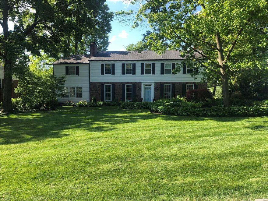 NEW PRICE! Stylishly appointed & updated colonial on a storybook lane. A brick pathway leads you to a robins egg blue front door that hints to what is on the other side. As you enter, you immediately notice the lightness that this home possesses. The formal living room with built-in bookcases and other classic details leads you to the stunning dining room with a fresh take that makes you want to linger. To the left of the dining room is a huge renovated family room that has a wet bar and leads to the screened porch. Both spaces are the perfect place to entertain friends and family. On the other side of the house is the light & bright kitchen that leads to the breakfast nook & hearth room. Upstairs you will find an updated hall bath, total of 4 bedrooms, one with its own sitting room. The generous master suite has 4 sets of closets, a large sitting room and master bath with his and her vanities. Huge list of updates to this home including HVAC, new windows in most of home & so much more