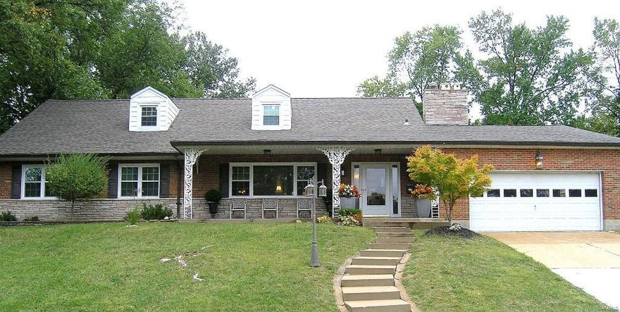 Almost 3,000sqft  in Country Club Subd.! 6 Bds & 3 full baths! The wonderful front porch welcomes you to a warm & charming home w/ Mnflr Mstrbd Ste + another possible large Mstrbdrm Ste upstairs! Great home for inlaws quarters.  Beautifully updtd (2013) Ktch w/newer laminate flrs, cust cabs, granite cntrs, gas range, & appliances +  pass thru opens to Brkfst & FR.  Enjoy the view from the FR w/full masonry wdbrng FP! W/out to parklike yard w/huge patio for BBQ’s! Large LR w/ picture window letting in tons of natural light + sitting area w/built-in shelving. Elegant DR w/ chairrail & crown mldngs.  Gorgeous wdfls throughout much of the home. Upper lvl has long hallway w/ 3 add’l bdms & tons of closet/storage space. Two dormers add light and place for small ofc/ work station. Classic accented tile baths w/newer light fix., vanities & commodes. Huge LL for play & tons of storage. Some newer vinyl tilt-in wndws, Zoned HVAC, updtd Elect. Panel. Bel-Nor Inspected! Near UMSL/Express Scripts!