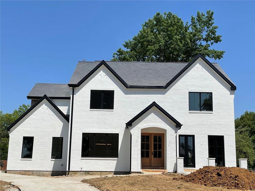 *** New Home To Be Built*** Another beautiful new custom home by MRM Manlin Development Group. National award winning Clayton School District. This beautiful 100' x 150' lot is the last remaining buildable lot in the exclusive private Lake Forest subdivision. Approximately 4591 square feet of total living space, including 5 bedrooms, 4.5 baths. Outstanding brick and stone exterior and high end appointments throughout the interior make this a showcase home. 9' ceilings on both the main level and the second level. Spacious rooms throughout. Kitchen features Wolf gas range and microwave drawer, Sub-Zero refrigerator, Asko dishwasher, walk-in pantry, planning desk and lots of extras. MBR suite with "his & hers" custom closets. Main floor laundry, office, mudroom, great room, dining room, breakfast room. Finished lower level family room with wet bar,  5th bedroom, and full bath. Crown molding, security system, inground sprinklers.  Just minutes to downtown Clayton, schools, highways.