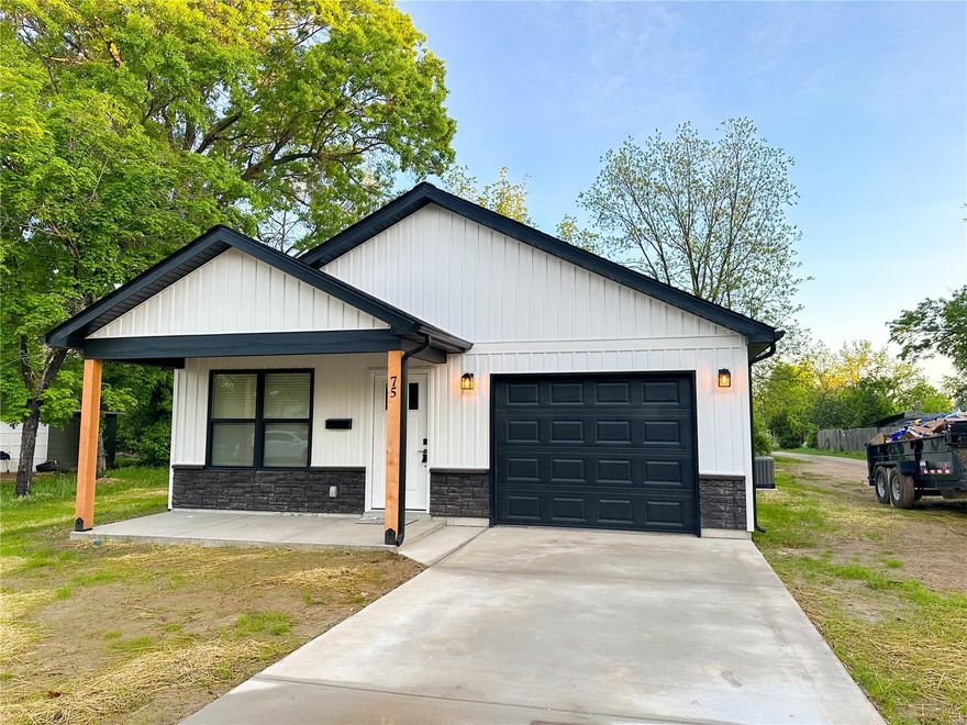 New Construction home with a covered porch! This 3 bedroom 2 full bath home has many upgraded features that include vertical white siding, black stone, black windows, black soffit and fascia, and a master suite! This affordable home comes with an open floor plan and 1 car attached garage included, what more could one ask for in a new construction home! Close to down town shopping and parks. Call for more information and to set up a builder meeting.