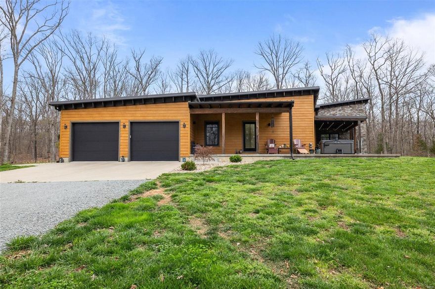 Stunning, custom home on 20 acres in Winchester Hills! This home is a perfect, peaceful retreat in Farmington School District! The great room boasts a floor to ceiling stone fireplace, exposed beams and lots of large windows to take in the beautiful, scenic views! The kitchen is one dreams are made of including custom cabinetry, walk-in pantry and granite counter tops! The large master suite has electric fireplace, huge walk in closet with custom cabinets, and master bath has his and her vanities and large custom stone shower. The other bedrooms are all great in size and have large closets! On the main floor you will also find an office, mudroom and large laundry room with custom cabinets! The basement has a family/rec room, wet bar area, half bath, and second master! Outside you will find 2 covered patios and a large shop. The shop has an apartment/bunk house, half bath and still plenty of room for all the toys! 

Come see it today!