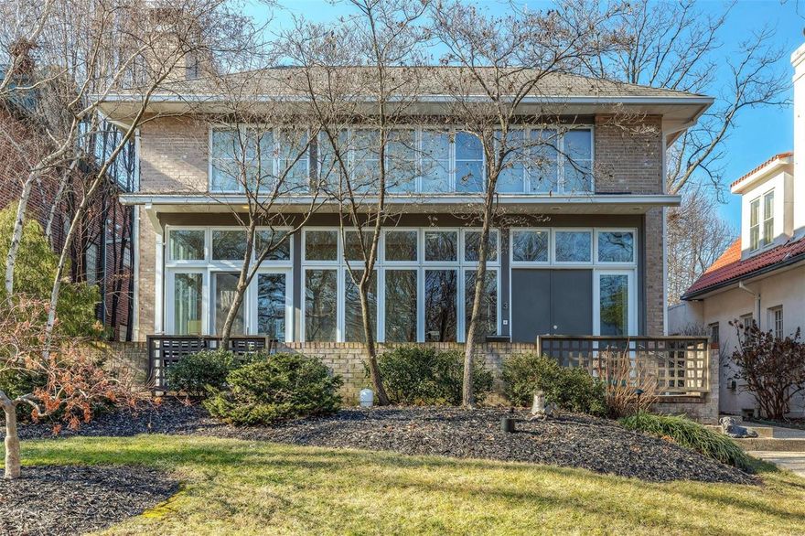 Architecturally significant home in Clayton is just steps off of Wydown Boulevard. Thoughtfully designed, this home creates space appropriate for today's lifestyle with many living areas all casual in feel. Rooms are not solely defined by walls but by level changes and transparent openings to gardens and waterfalls. An abundance of windows allows the light in and the feeling of being surrounded by nature. Four bedrooms and four full baths, a finished lower level, two car garage and so much more make this home incredibly desirable!