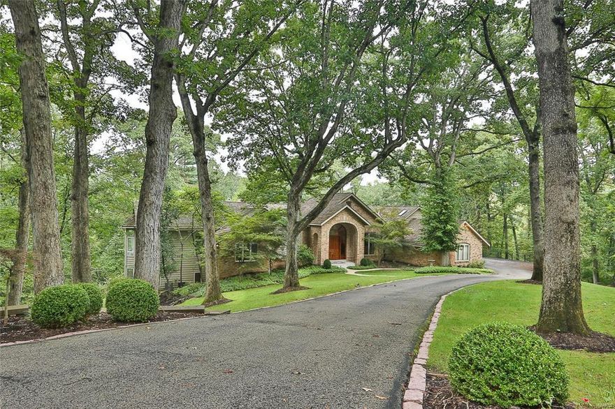 Astounding & Beautifully built Custom 5 Bedroom, 5.5 Bath, Ranch style home situated on a gorgeous 3 acre lot with private heated in ground Pool surrounded by dual brick paver Patios.  Brick accent exterior with an amazing front Porch & beautiful wood French entry  doors welcome you inside to a very distinctive 2 Story Entry Foyer & the start of a phenomenal open floor plan.  This sensational home features include 4 fireplaces, crown, vaulted & 10' ceilings, 2 wet bars, surround sound system, French & Atrium doors, Bay windows, 2 spiral stairways, marble & wood floors, zoned HVAC, heated dual 4 car Garage, 50 year old shake roof & more.  Great room, Den, Dining room & Kitchen all flow together.  Amazing Kitchen with granite, custom 42" cabinets, stainless steel appliances, triple sink...  Master Bedroom Ensuite with fireplace, walkout & spa Bath including a Sauna & a wet bar.  Upper level Loft with wet bar, sleeping area & full Bath.  Lower level with Family/Rec room, walkout & more.