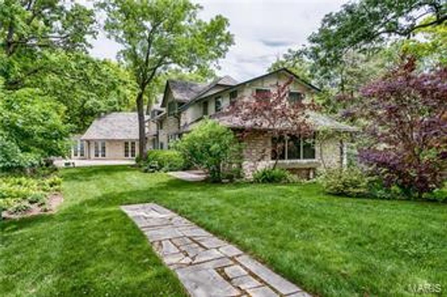 Situated on 5.3 acres of lush greenery with mature trees and breathtaking panoramic views of the Missouri River Valley, 901 Wings Rd epitomizes privacy and exclusivity. Constructed in 1926, this property once served as a social and sporting club for St. Louis’ elite. Today this 6 bedroom, 4 bathroom home provides all of the modern comforts you desire while maintaining the elegance and history of the residence. The Wings hosts a seemingly endless list of amenities from top of the line Viking, Sub Zero and Miele appliances to a personal Tee Box! You will love entertaining guests under the stars on the magnificent flagstone patios with incomparable views or in your very own private pub. The detached carriage house boasts a spectacular 932 SF loft apartment with cathedral ceilings and wood flooring. Photos simply do not do this home justice. A truly must see home, you will be stunned by the beauty and historic remnants (such as the functional hidden safe) throughout the sprawling 5,985 SF