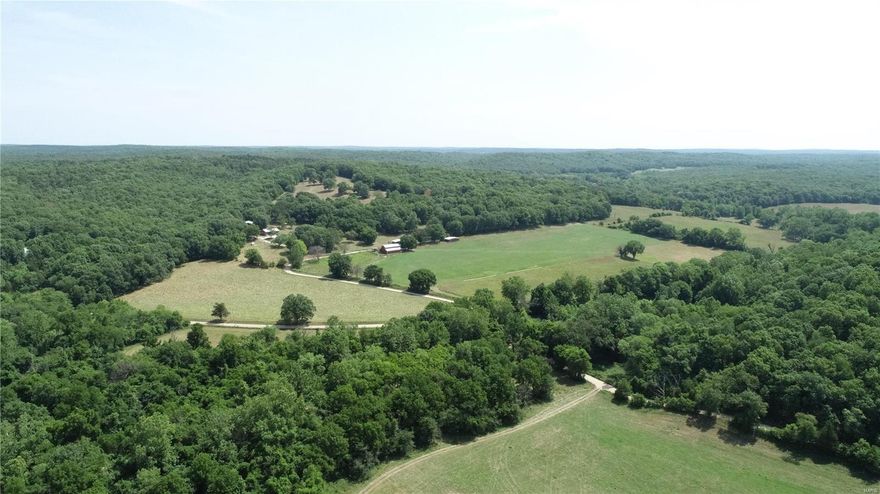 400 +/- Acres located approximately a half mile northeast of Cook Station. Farm is currently used for livestock and recreation. Approximately 90 acres of pasture and 300 acres of marketable timber exist on the property.  There is over a quarter mile of Meramec River frontage that provides the opportunity to fish, float or find your favorite swimming hole.  Taff Branch creek also feeds into the Meramec River on the farm.  An 1800 sq. ft. 4 bed 2 bath ranch sits in the middle of the property. Livestock operation includes numerous outbuildings, workshops, all metal corral and priefert head chute. Current owner has had great success deer and turkey hunting shooting several trophy bucks.  Abundance of history and geology on the farm including an old closed hematite mine, Crooked Creek Crater debris, Osage Indian artifacts, old coal mine, small cave and rock formations. Whether your looking for expanding your cattle operations or a recreational get away this property has A LOT to offer!