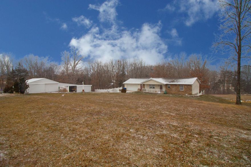 Country living close to town!  This 3 bed 2 bath ranch home that was custom built by the owner is nestled on 3.06 UNRESTRICTED acres just off blacktop. Outside you will find tons of storage; a detached building that includes a 24x28 bay with concrete floors, 24x22 lean-to with 3 sides and a 21x22 bay or all of your outdoor toys! Indoors you will find your very own pet grooming spot to keep those doggies squeaky clean or the perfect area to convert into whatever space fits your needs and hobbies best. The eat in kitchen will be the perfect spot to enjoy your morning coffee and enjoy you new, quite county home! Schedule your showing today! Additional Rooms: Mud Room