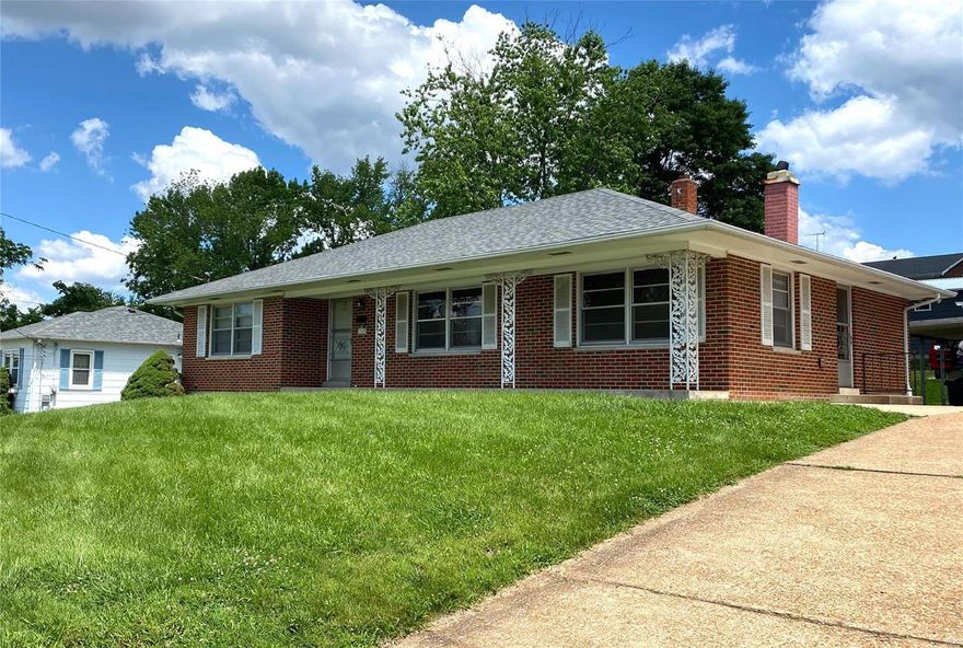 Full Brick, ranch home with 3+ BRS, 2 full ba, a 2-car detached all brick garage and a storage shed, all on 1.5 lots in Washington.  Beautiful wood laminate flooring in Living Room (HARDWOOD FLOORS UNDER) and Dining Room which features a wood-burning stove, and in the spacious kitchen with new dishwasher and some updated features.  Some updates can also be found in the main floor bath that offers 2 linen closets.  Huge Master Bedroom features new carpeting 2 closets.  The 2nd bedroom also has new carpeting.  The 3rd BR is huge, has gorgeous wood floors, and doublet closets.  The walk-up Lower Level features more gorgeous wood laminate floors in the family room and bedroom which offers double closets.  The convenient, recently updated, Lower Level full bath features a new tile shower.  This sturdy home has been freshly painted, has an attic fan, and a newer roof.  The back yard with a covered patio, alley access and offers plenty of room for parking your RV or Boat.