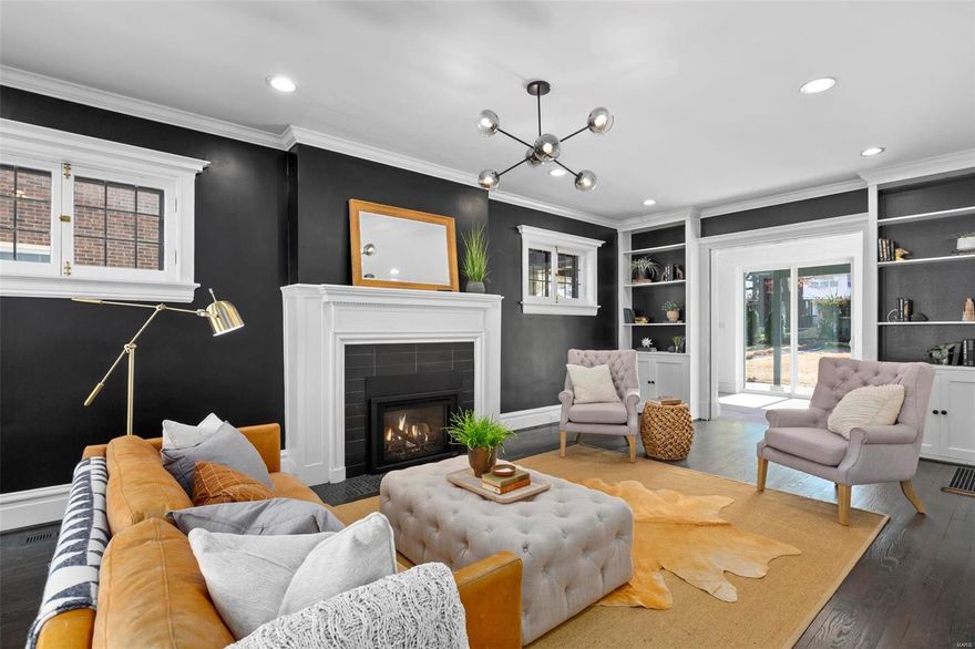 This is the home you’ve been waiting for after a 10-month professional rehab! This Georgian colonial, in coveted Forsyth Place on quiet “Little Lindell” is walking distance to Forest Park, Wash U & Clayton shops/restaurants. Spacious & bright entry foyer welcomes you into either the LR or DR through majestic archways w/ all new hardwood floors. Generous sized LR dressed in elegant details like built-in bookshelves, Forshaw gas fireplace & period millwork. The eat-in Chef’s kitchen is decked out in new Viking appliances & the open floor plan is ready for entertaining. Main level also features beautiful staircase leading to 2nd & 3rd levels which feature not 1 but 2 Master Suites w/ completely renovated baths & floating vanities! 2 additional generous sized rms on 2nd level have been refinished w/built-in storage closets, added study spaces & 2nd floor washer/dryer. Enjoy the outdoors on a new, open patio w/ two huge sliders & a second covered patio & two-car garage.