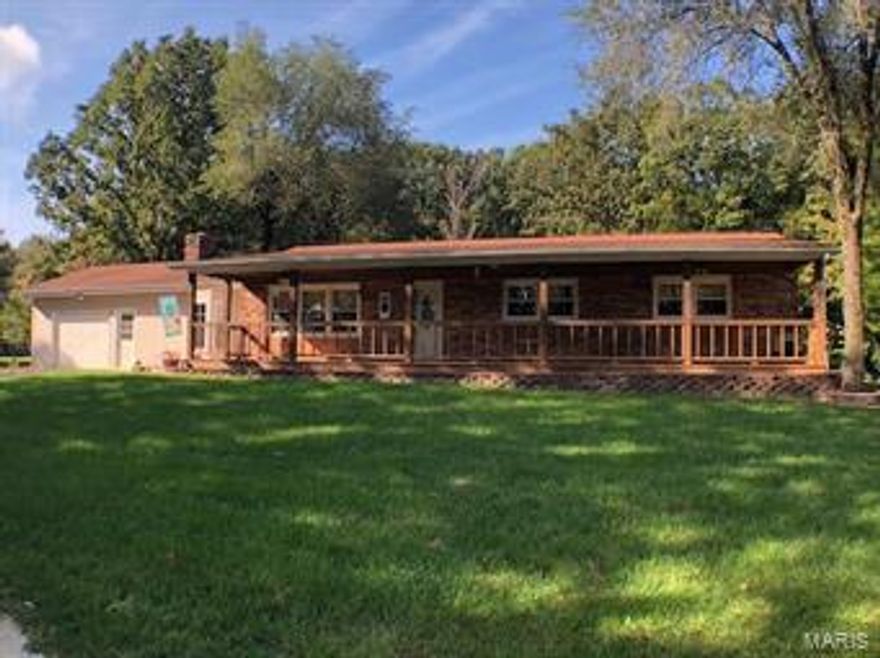 Very nice piece of land and just the perfect size for a hobby farm at 20 acres. The rectangular piece of property is all set up for cattle with out buildings- barn, steer barn, corral, sheds and 40 x 40 mechanics shop with office, electric, water, insulation, 1/2 bath, gas furnace (not hooked up) and 16 ft doors. The 1600+ sq ft residence has been well maintained and updated and has a 50 x 8 ft covered porch on the front. 1 yr old kitchen appliances and reconditioned painted kitchen cabinets, under counter lighting and touchless kitchen faucet, new flooring throughout, newer windows, 12 yr old roof and 10 yr old HVAC. Separate family room with wood burning fireplace and living room. 3 nice bedrooms with two full bathrooms. Master bedroom is generous with large walk in closet. The backyard is secluded and perfect for entertaining with an above ground pool and surround deck and separate patio. This hobby farm supports 8-10 head of cattle or would be perfect for horses.