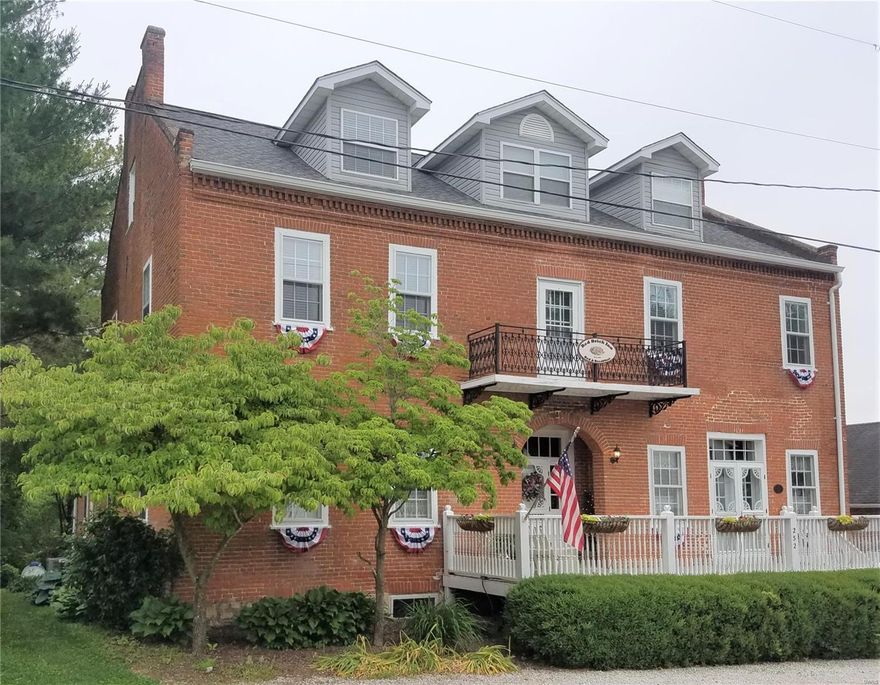 Welcome to the Crown Jewel of Augusta in the heart of MO Wine Country. Built in 1865 & on the National Registry of Historic Places, this solid brick home w/stone foundation offers 5 bedrooms, 5 1/2 baths, 2 wine cellars (currently used as rec room & office), 18x36 saltwater pool, hot tub under gazebo, original wood floors, transoms & beautifully restored. 1/2-acre lot m/l, huge 2-car garage, full w/o basement, walking distance to wineries, shops, restaurants, Wine Trolley, blocks from the Katy Trail, over 5,000 sq ft of living area, turnkey (with some exceptions) stylish decor, huge bedrms, all ensuite baths. Live in a part of history as this home was originally built as a general store for John Schroer. Be part of the up-and-coming Missouri Wine Country, America's first designated AVA & walk the streets of this quaint, picturesque little town 45 minutes from St. Louis. By appointment only, owner agent. Suitable for Bed/Brk Additional Rooms: Wine Cellar