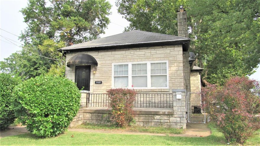 Back on the market--The buyer got cold feet, so this could be your opportunity!! This spacious home is conveniently located and sure to please! You will find traditionally desirable features, like gorgeous hardwood flooring, wood-burning fireplace, arched doorways, 2 full bathrooms, additional sleeping and storage rooms in the walk-out lower level, covered back porch and fenced yard. This home is also loaded with upgrades and updates, like granite kitchen counters, gas range, newer lighting, deep double-bowl stainless steel sink, custom cabinets, ceramic tile flooring, newer bathroom vanities and fixtures. Detached 2-car garage and off-street parking for several additional vehicles. This home is being offered in its current condition, so the seller will not provide or pay for any repairs or inspections. THIS is your opportunity. Now is the time to BUY!