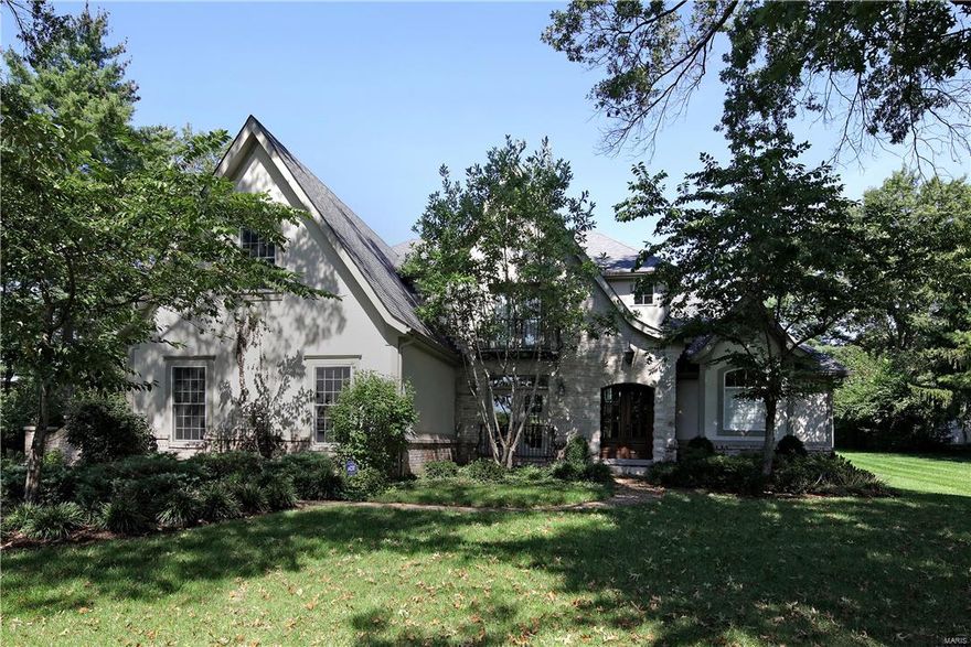 Meticulous  1.5 story custom home with 4 bedrooms, 4.5 baths featuring high end finishes and terrific open floor plan.   The light and bright kitchen with wood floors boasts Jenn-Aire appliances and granite counter tops that open to the stunning hearth room with French doors leading to outstanding pool and patio area.  The two story living room and elegant dining room with coffered ceiling offer great entertaining both formal and casual.  Terrific main floor master suite with walk in closet and luxury bath complete the 1st floor.  Upstairs are three generous bedrooms, two baths and expansive children’s family room over the oversized 3 car garage.  Finished lower level with huge Rec room, office (could be extra bedroom) , exercise room, full bath and incredible storage areas.  Serene fenced pool on lovely level landscaped lot.  VERY MOTIVATED SELLER