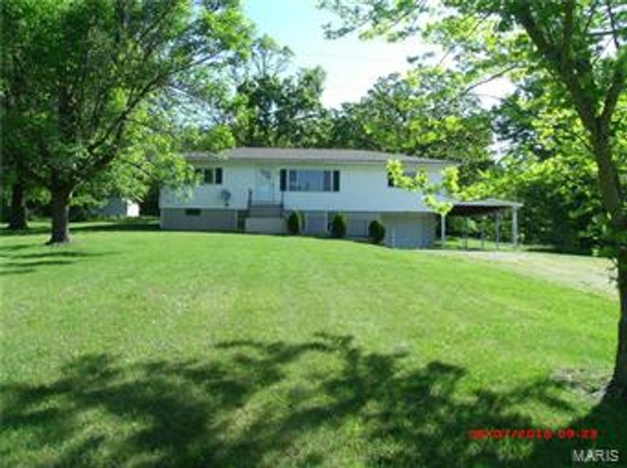 HA864 Looking for a little room to roam, with outbuildings for the big toys. Check out this house. Four nice size bedrooms and a full bath on the main floor plus large eat in kitchen and living room plus rec room, full bath and utility room in the lower level.  The kitchen offers white cabinets, ceramic counter tops and backsplash, a gas range, refrigerator and dishwasher.  Nice deck off the kitchen faces the back yard and offers the perfect place to sit and enjoy yourself.  Rec room has a dry bar for entertaining. There are 2 large outbuildings and 2 smaller ones for equipment. A one car attached garage with entry into the basement. This home is just 4 miles west of New Haven.  Cute, clean and ready for your family to move in.  This is a Fannie Mae HomePath property. SpecialListingConditions: Foreclosure
