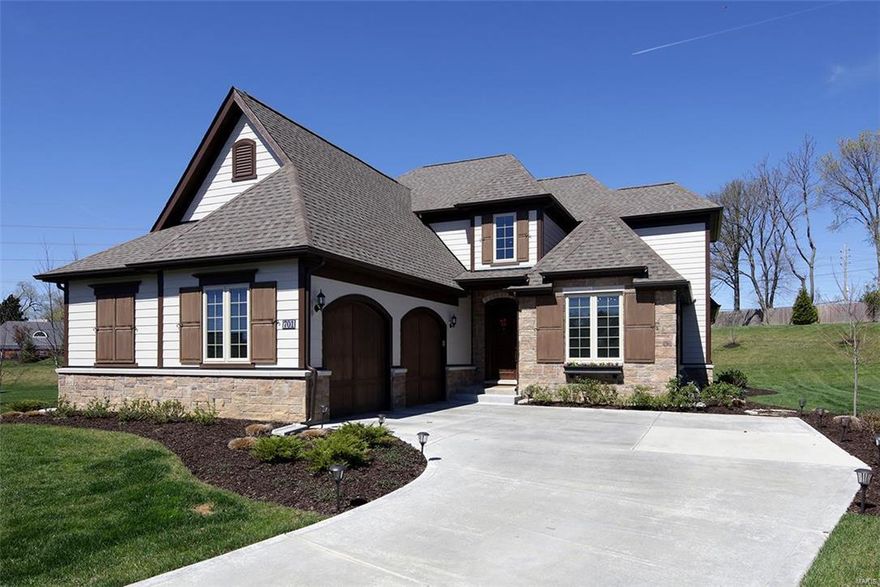 PRICED TO SELL!! Incredible opportunity to get into Ladue's newest full service neighborhood, The Woods of Ladue Lane!
Built in 2016, this 5 bedroom, 3.5 bathroom home comes fully loaded with all the bells and whistles, and the HOA takes care of 100% of the grounds for only $475/month! This home offers the largest lot and the highly coveted back cul-de-sac! Luxurious first floor master suite, vaulted ceilings, deep pour finished basement with bar, bedroom and full bathroom, hardwoods floors, first floor laundry room/mud room, and side entry 2+ car garage! Upscale living with no responsibilities...move in and relax! Ladue Schools! Additional Rooms: Mud Room