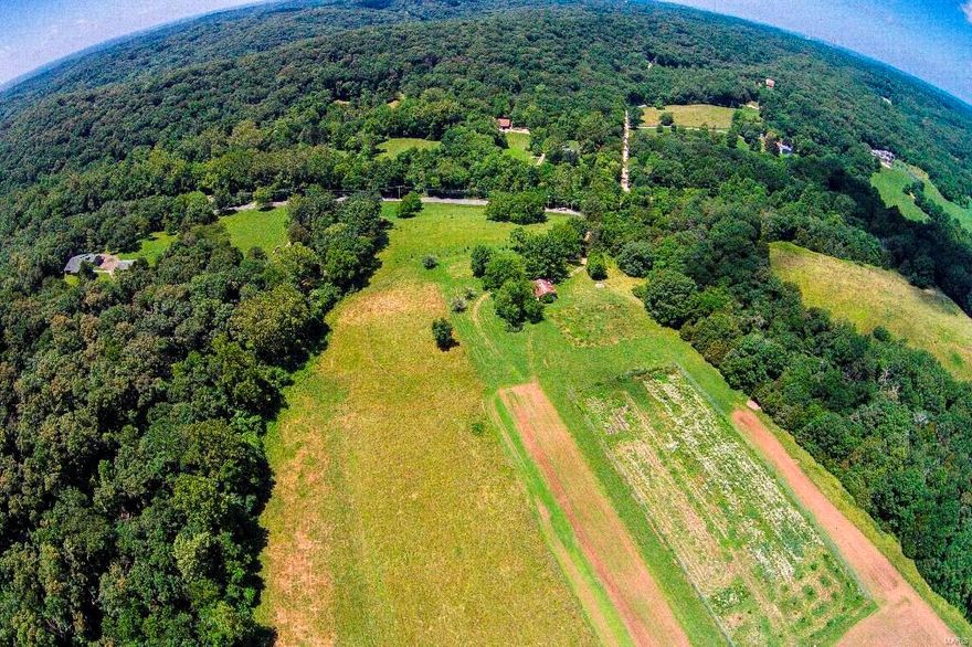 Crave Privacy??? Get away from it all on your own private pristine 80 acre estate! Got Horses? Fantastic 80 acres & bordered on 2 sides (North & East) by Rockwoods Range & access to Greensfelder give privacy & access! * You could ride forever! Want to build your own dream home? Rare opportunity to own one of the last big gorgeous private parcels in Wildwood! Western portion of St. Louis Co.West of 109 & between 100 & 44! ! Could also be subdivided into 3 acre lots! Zoned NU: Non-Urban. Minimum 3 acre lots. Max yield 26 lots per Wildwood. Gently rolling to sloping topography.  Majority rolling terrain.  40%-50% is cleared. Remainder wooded.  Site contains  1 shed, well, septic, cisterns. Electricity on property. Registered small Schlemper Cave.Phase 1 & Geotechnical Report from 2006 available. Don’t miss fantastic opportunity! 4452 & 4376 Fox Creek tied to 27Y-24-0023