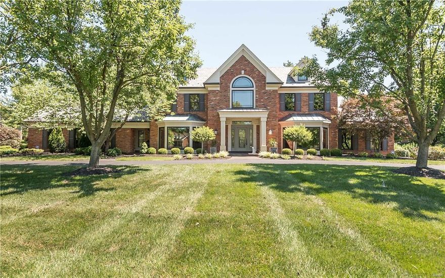 Back on the Market! No fault of Sellers!  Open floor plan. Soaring two story entry foyer with winding staircase. Formal dining room with bay window and coffered ceiling. Office/music room with bay window and built in bookcases. Massive great room has a combination boxed beam and cathedral ceiling with fireplace and windows that overlook serene pool area and backyard. Garden room opens to a pavilion/covered patio with gas fireplace perfect for entertaining! Eat in kitchen with Thermador appliances. Sun room. Main floor laundry room. Main floor master suite. Additional three bedrooms plus loft and two baths in the upper level. Lower level includes a huge rec room with built in bookcases, entertainment center and massive wet bar! There is also an exercise room, two offices, full bath with shower and a HUGE storage area!  Irrigation system. 3 car rear entry garage. Updates include roof, gutters, most windows, HVAC and garage doors. Pool re-plastered and tiles replaced this past summer! Additional Rooms: Sun Room