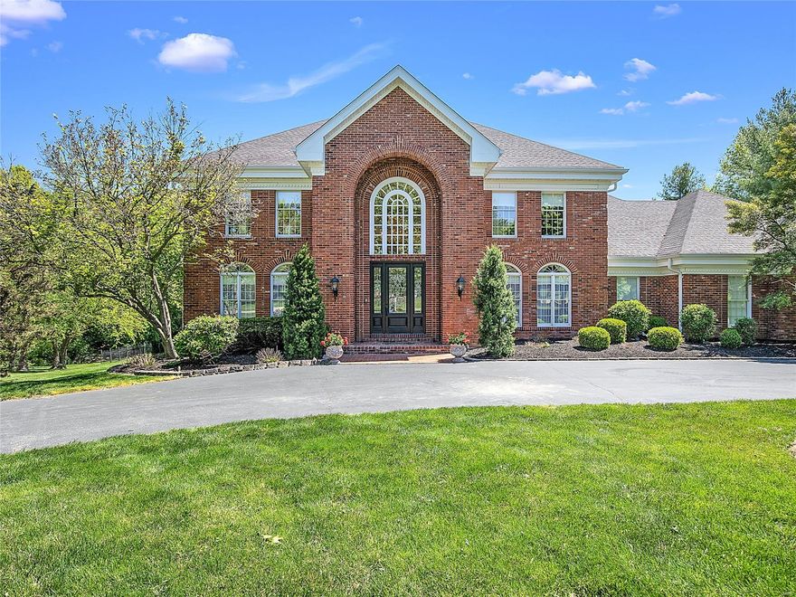 Picturesque & park like is a perfect way to describe this special home on one of the more private lots located in sought after Dunhill! This custom built home was meticulously cared for, loved & well appointed by the original owners. The marbled entry foyer is stunning w/ winding staircase, arched entryway & leaded glass front door that welcomes you to the gracious living rm & dining rm. The 2 story great rm is a perfect spot for entertaining w/bar & look through fireplace to the adjoining sun rm. The updated kitchen boasts quartz counters, stainless appliances, & flows into the vaulted hearth room, & near the laundry rm. The sizable master suite & bath have separate vanities, tub, shower & expansive closets. Upstairs there are 4 beds w/ 2 Jack & Jill baths.  The walk-out LL is amazing & offers a full kitchen, bar, bed rm, bath & lots of storage.  The level large secluded lot provides a gorgeous pool, extensive landscaping & deck.  Wonderful opportunity & surprising square footage! Additional Rooms: Sun Room