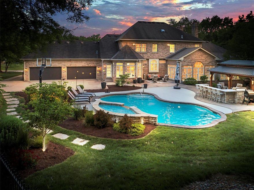 Town & Country stunner is an entertainer's dream-secluded pool, expansive patio, outdoor kitchen and heated gazebo. Inside you'll find exquisite millwork throughout-box beams, extensive crown molding, paneling and built-ins. Chef's kitchen w/ premium countertops, custom cabinetry, professional appliances, commercial style hood, center island & butler’s pantry. Great rm, formal dining, walls of windows, 2 story foyer & study. Laundry rm w/ island and loads of counter/cabinet space. Mstr bdrm ste includes huge walk-in closet, cast stone frplc, luxurious bath and private study. High end lighting & sound technology throughout. 2nd Floor has 9' ceilings, plush carpet and 3 spacious bdrm suites-each w/ closet-complete w/ custom laminate shelving. Incredible Lower Level with rec room, fireplace/family room, theater, gym, kitchenette, steam room, and wine closet. 4 car garage includes a separate laundry. Too much to list. Please take the video tour & get the complete list of custom features. Additional Rooms: Wine Cellar