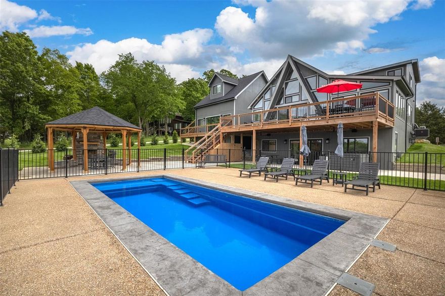 Welcome to 811 Aspen Vista View! Truly a one-of-a-kind exceptional lakeside retreat at Innsbrook Resort! This stunning 6-bedroom, 5.5-bath chalet offers over 3,000 sqft of luxurious living space, designed for both relaxation & adventure. Situated on the serene shores of Lake Aspen, this property boasts 176' of shoreline, featuring two private beach areas, a lakeside seating area, & a private dock, perfect for kayaking, swimming, & fishing. Inside, you'll find a fully equipped kitchen, spacious living areas, & modern amenities providing multiple entertainment options. Outdoors, enjoy the expansive deck with a grill, perfect for family gatherings or a peaceful evening under the stars, inground pool, hot tub, & gazebo. Currently operating as a highly-rated short-term rental with professional property management in place, this property offers a unique investment opportunity or the perfect family getaway. Experience the ultimate in lakeside living at this remarkable Innsbrook property. Additional Rooms: Sun Room