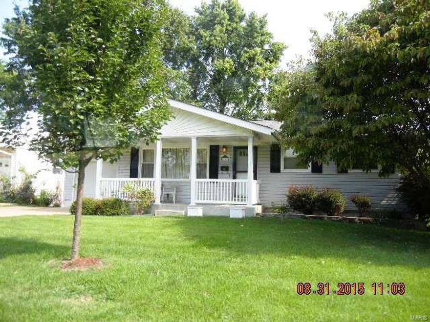 New price! Shows beautifully! Spacious covered front porch leads into an open and inviting floor plan! This house has been freshly painted, newer carpeting on main floor, ceiling fans in bedrooms and dining room, and more! Originally a three bedroom floor plan, the third bedroom is currently a dining room off the kitchen. Partially finished basement has a dry bar area, family room and a bath with shower. There are many updates to the home including: vinyl exterior siding, enclosed soffits, replacement windows, doors, and a high efficiency furnace. Vinyl replacement windows are a plus! The kitchen overlooks the large fenced back yard with two storage sheds. Enjoy summer evenings on the covered back patio! Centrally located in the city of Florissant! This home is ready for a new owner!  (Washer/dryer, refrigerator-Appliances as displayed, sold as-is) Currently the third bedroom is being used as a dining room, closet remains, wall can be replaced, address in contract.