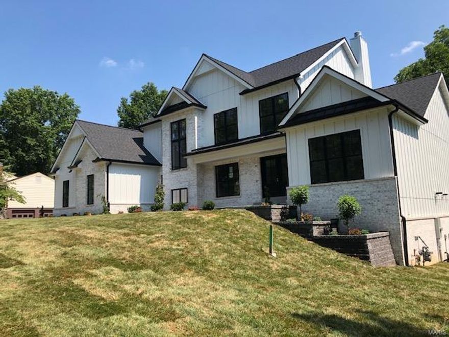 Exceptional opportunity for new construction in Des Peres in the desirable neighborhood of Hickory Hills. Completion July 2020 by notable builder DeBrecht Homes features a Modern Farmhouse open floor plan designed to accommodate daily comfort and gracious entertaining. hardwood flooring and 9' ceilings add to the appeal of the main living area that includes private study, formal dining room and spectacular great room highlighted by vaulted ceiling with dormers and a second-floor overlook. Culinary enthusiasts will love the designer kitchen with custom 42" cabinetry, quartz countertops, commercial grade appliances & center island. Situated on 1/2 acre includes a covered/screen porch and patio and plenty of room for a pool. Main floor master suite with luxury bath plus 3 upper level ensuite bedrooms, loft, a main and 2nd floor laundry complete the living quarters. Finished walkout LL includes a bedroom bath. 3 car garage. Additional Rooms: Mud Room, Sun Room