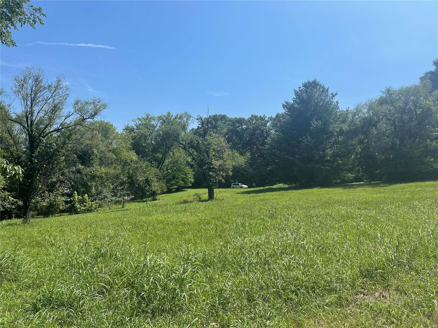 2.36+/- Acres in desirable PRIME CHESTERFIELD LOCATION along Eatherton and Wild Horse Creek Road. Property is flat and partially wooded with a house, garage, & shed. Property is being sold in "as is" condition. It is truly a "diamond in the rough". No subdivision, so no restrictions. Within the Rockwood School District with easy access to Hwy 40, shopping, dining, and Chesterfield amenities.