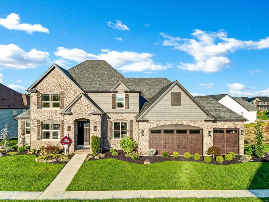 Here's your chance to own the Lombardo showcase home in beautiful Streets of Caledonia! This luxurious 1.5-story backs to a lake & fountain & is lavishly appointed w/every feature you desire! Outstanding chef's kitchen boasts quartz counters, brick arch feature wall w/tile backsplash surrounding the 5-burner gas cooktop, chimney hood, & pot-filler faucet, huge breakfast bar island, double wall ovens, industrial built-in fridge, wrap-around butler's pantry, & walk-in pantry w/custom organizer. Gorgeous home office w/trey ceiling & French doors. Opulent main floor primary suite w/spa-like bath w/separate vanities, multi-head shower & soaking tub, & 13'x11' walk-in closet w/custom organizer. Gather in the loft w/vaulted ceiling or great room w/custom built-ins. Covered composite deck overlooking the lake. Unfinished walk-out LL w/9' pour & roughed-in bath. Neighborhood pool, clubhouse, pickleball, bocce ball, playground, walking trails & more. Wentzville (Liberty) Schools. See it today! Additional Rooms: Mud Room