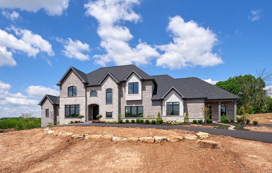 NOW COMPLETE AND READY FOR IMMEDIATE CLOSING! MOTHER'S DAY OPEN HOUSE SUNDAY 5/10/2020 2-4 PM.  Rehnquist Design & Build, Inc. Spec home. with approx 6,300 sq. ft of living area. Exquisite 1½ story, 5-bedroom, 4 car garage home in an enclave of 7 new homes off Mason Rd. in Town and Country. Set on a 2.1-acre homesite, level yard with side walkout. Ready for custom pool. Open floor plan allows kitchen, breakfast and gathering rooms to flow together. Each area has a large expanses of windows and French doors opening to the rear of the property. Large master suite featuring “his and her” walk in closets, spacious finely detailed master bath. Main floor guest suite. High level of finish with multi-piece crown molding, beams and cased openings and doors with high end cabinetry. Second floor consists of 3 full en-suites, bonus room,2nd floor laundry room. GPS 1919 S Mason Rd. Town & Country 63131.