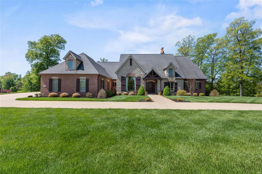 A Remarkable Find....A Wonderful Custom Brick and Stone Ranch home in Windwood Lake Estates with too many amazing features to list!  This home was built with uncompromising quality, impeccable finishes, and has been meticulously maintained by the original owners. Beautiful hardwood floors, not just one but four fireplaces that provide warmth and style, two large living areas the main level with vaulted ceilings and custom built-ins throughout. A kitchen that boasts all the counter and storage space you could ever want with Kitchen Aid custom cabinet appliances, granite countertops and a great walk-in pantry. The main level primary bedroom retreat is so roomy, with a luxurious bathroom that has it all.  You just have to see the incredible lower-level walk-out with so many windows, custom built-ins and two incredible guest suites. The outside living areas are stunning with wrought iron accents, stone built-ins and luscious landscaping is to die for! Come see this beauty!