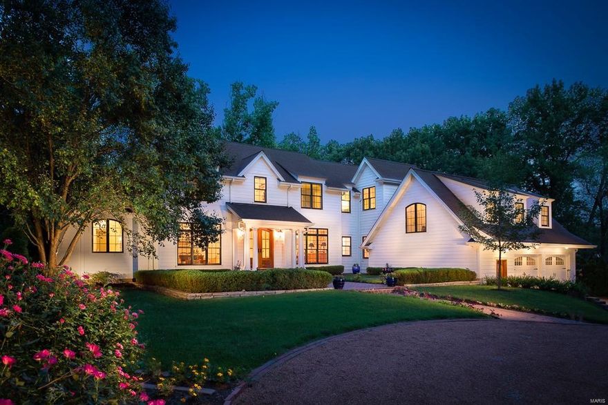 Inviting New Price. Enjoy the color of the season in your new Hamptons-like home.  Reminiscent of the resorts in Cape Cod and Nantucket w/ fresh color palettes & incredible natural light, this charming all-en-suite five bedroom home nestled on a very private acre lot is the perfect place to kickback or entertain family & friends. Well-designed spaces flow together w/spectacular views from every room. Natural sunlight pours in courtesy of walls of (all Pella) windows, transoms & French doors. Well-equipped chef’s kitchen adjoins breakfast & vaulted hearth rooms & features the best in appliances, a large island, 2 sinks, custom white cabinetry w/glass fronts & pretty granite. 1st-floor master suite tauts bay window/seat, plantation shutters, carrera marble bath. 5th bed would make perfect home office. IPE deck overlooking pool accessible from master, living/hearth rooms. Vaults, built-ins, 2 fireplaces, gleaming hardwoods, nice lower level and more. Convenient walking path to Chaminade.