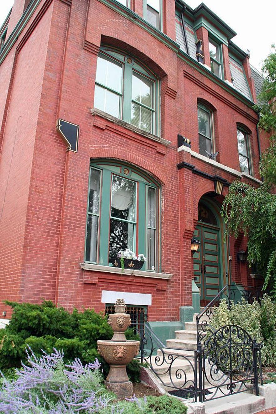 WOW! SPECTACULAR, ENERGY-EFFICIENT MODERNIZED HISTORIC HOME! Victorian with 8KW solar system – owner reports that electric bills have been as low as $10*. 
The best of old and new in 3-story townhouse on corner lot in sought after Lafayette Square location.
1st floor has dramatic vestibule w/custom staircase, fireplace, powder room, parlor, formal dining room, eat-in large kitchen w/gorgeous marble, custom cabinets &amp; deluxe appliances. 2nd floor has 2 big bedrooms, den/office (potential 5th bedroom), huge bath w/glass block shower, jetted tub, sauna, laundry room. 3rd floor has 2 large bedrooms, wet bar full bath. Lower level has 8 ft. ceilings, some brick floors, workshop w/gigantic sink, Add'l amenities: ample closets, 2 newer decks, parking pad, central vac, security system, skylight, zoned HVAC, beautifully landscaped, fenced yard. Fabulous walk about urban location, park, restaurants, specialty shops. (* Buyer may obtain independent verification)