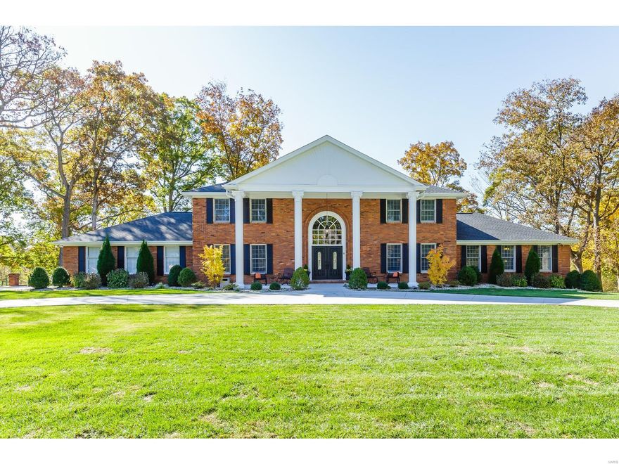 MILLION DOLLAR VIEWS! Situated on one of the best lots in the Forest Hills subdivision, this magnificent colonial overlooks the 11th  fairway of the golf course. Space abounds with nearly 5000 sq. ft of finished living area. Meticulously renovated, 5+ beds/5 baths, zoned HVAC, grand foyer with winding staircase, custom moldings, executive office, dining rm, gourmet kitchen w/42" custom cabinets/cupboards, stainless steel appliances, quartz countertops and island w/drawer microwave. Double French doors flank a marble-framed gas fireplace in family rm and open to a large deck. Presidential main-floor master suite w/separate sitting rm, bath w/jetted tub. Finished walk-out lower level w/rec rm, expansive bar w/granite top, gas fireplace, billiard area, fitness room, possible 6th bdrm & full bath. Sprinkler system, hot tub, huge patio w/gas fire pit to enjoy the incredible sunsets! Living in Forest Hills offers a prestigious country club lifestyle and this home is an entertainer’s delight!
