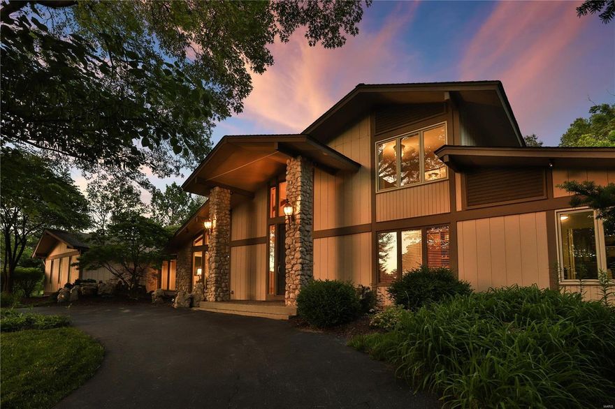 This exquisite, Mid Century Modern executive home is tucked away in a private cul-de-sac of pure serenity in the most desirable Creve Coeur location!  It is smashing when you walk in, with soaring ceilings, wood paneled study, huge living and dining room. The great rm has a fireplace, built-ins, beamed vaulted ceiling,maple flooring and a wall of windows overlooking the newly totally renovated back yard. The chef's kitchen remodel was completed in 2017, Stainless high end appliances, slide out cabinet drawers, center island, Quartz counters, breakfast rm, built in wet bar, and wine racks. There is a mud room with custom cabinets, w/pull outs, wine fridge, that walks out to the outside, and to the oversized 3 car garage. One garage door is to the ceiling for a boat or camper parking. Spacious main floor master suite w/tray ceiling,huge master bath, walk in cedar closet and double closet. Luxurious living abounds with the private heated pool, new patio, and  hot tub. Absolutely stunning! Additional Rooms: Mud Room