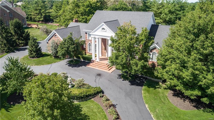 Reduced !! Exquisite & Elegant Custom 1.5 Story Estate Home on over 1+ Acre Grounds in Premier Gated Community!! Offering over 7400 sq ft of Luxury Living, Enhanced by the Finest Craftsmanship w/Meticulous Attention to Detail ! Grand 2 Story Foyer w/Gorgeous Sweeping Staircase, Marble Floors Extending into The Dining Rm. w/Upgraded Ceiling & Molding. Library w/ Bookcases & Wood Tray Ceiling. Dramatic Great Rm. w/ 2 Story Palladium Windows, Fireplace & Walk Behind Wet Bar. Amazing Master Bed. w/ Fireplace, Refrigerator, Tray Wood Ceiling & His & Her Closets. Mast. Bath offers His & Her Vanities, Jetted Tub & Shower w/Multiple Jets. Gourmet Kitchen Offers High End Appl. Granite Counters & Adjoins the Light Filled Breakfast Rm. & Vaulted Hearth Rm w/ Fireplace. Incredible ! L.L W/O Offers Stone Walls & Fireplace, Walk behind Bar, Dishwasher, Refrig. Granite, Game Rm. Family Rm, Workout Rm, Billiard Rm & a Aspen Spa ! Prof. Landscaped Lot w/ Circular Dr. Sun Rm & Deck